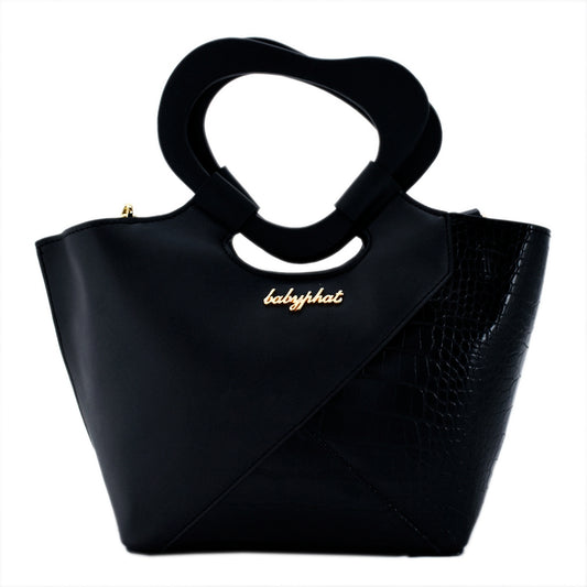 Bolsa [Baby Phat] tipo satchel crossbody con diseño etilo animal print y asa de corazón color negro