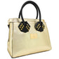 Bolsa [Baby Phat] tipo satchel crossbody con estoperoles color dorado