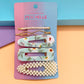 Set de 4 broches para el cabello Peschelle multicolor