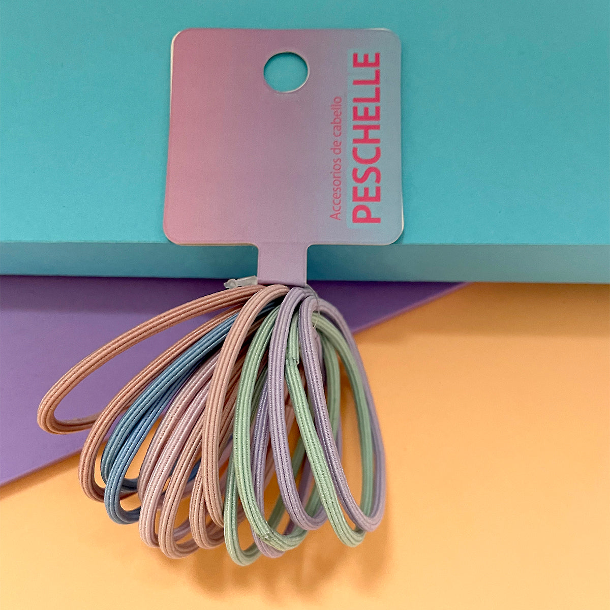 Set de 15 piezas ligas para el cabello Peschelle multicolor