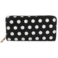Cartera para dama Peschelle con diseño de lunares blancos color negro