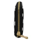 Cartera para dama Peschelle con diseño de lunares blancos color negro