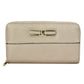 Cartera para dama Peschelle con moño decorativo color oro