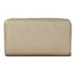 Cartera para dama Peschelle con moño decorativo color oro