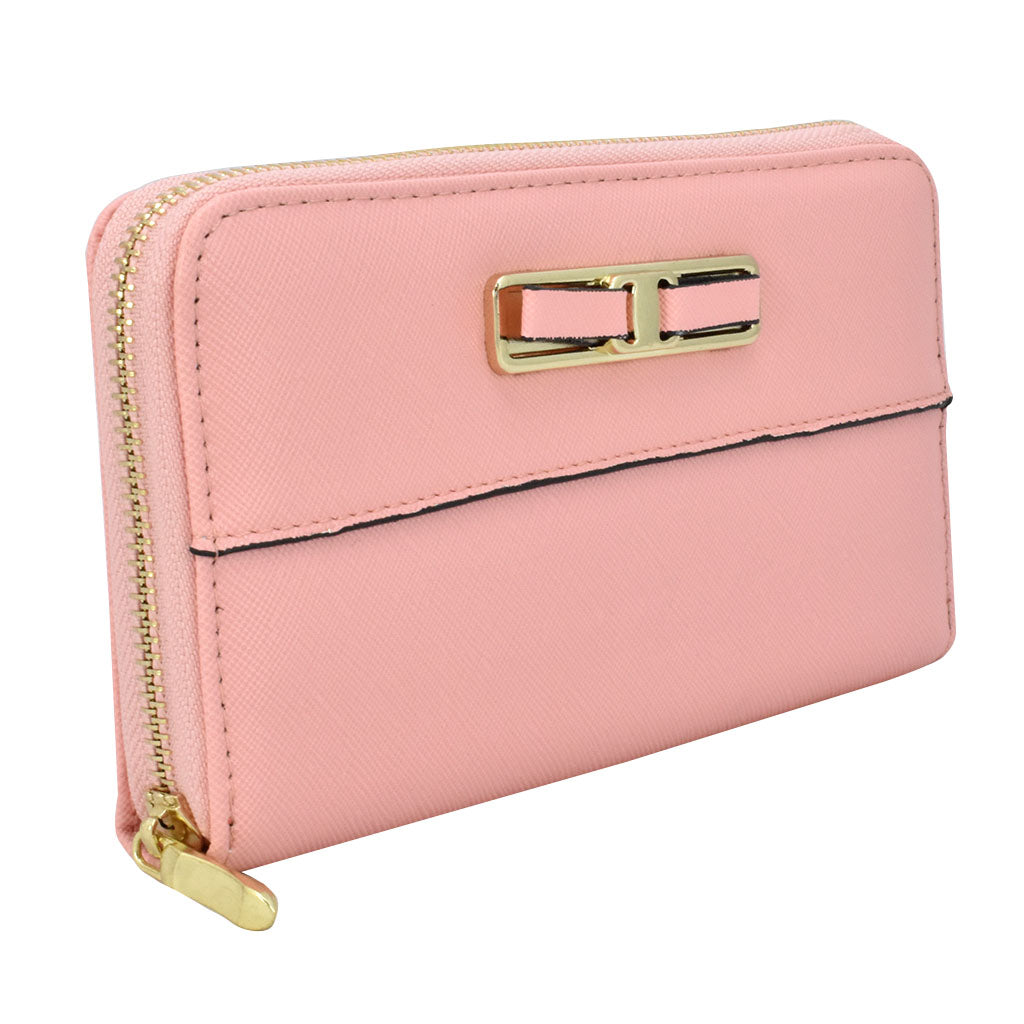 Cartera para dama Peschelle con moño decorativo color rosa
