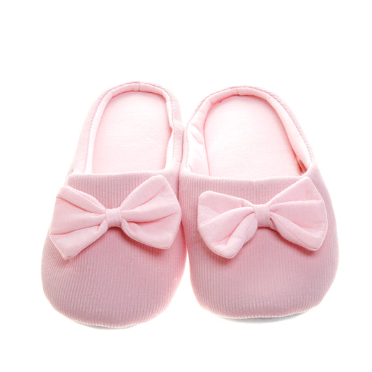 Pantufla Peschelle afelpada con diseño de moño color rosa