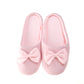 Pantufla [Peschelle] afelpada con diseño de moño color rosa