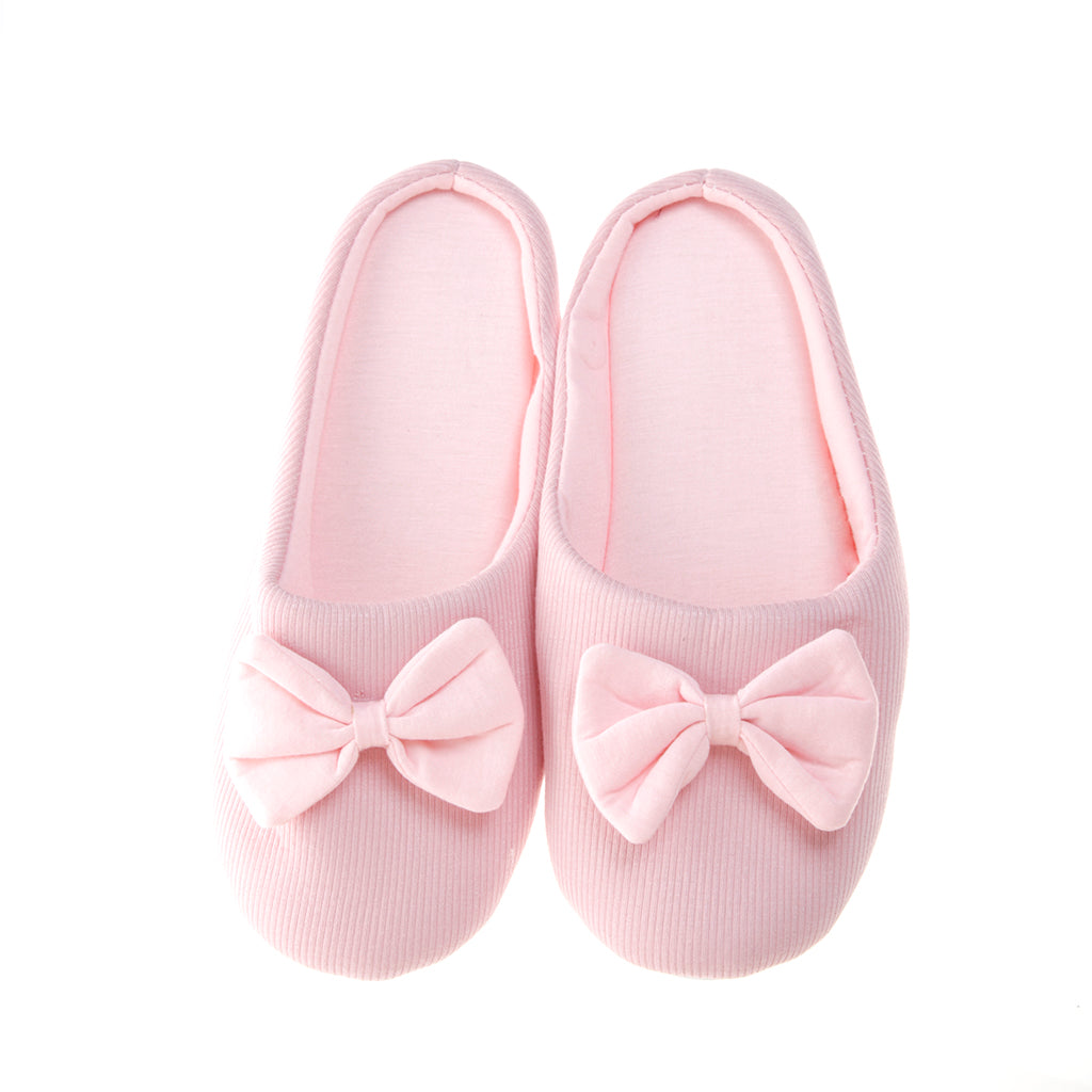Pantufla [Peschelle] afelpada con diseño de moño color rosa