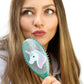 Cepillo ovalado acojinado con diseño de unicornio
